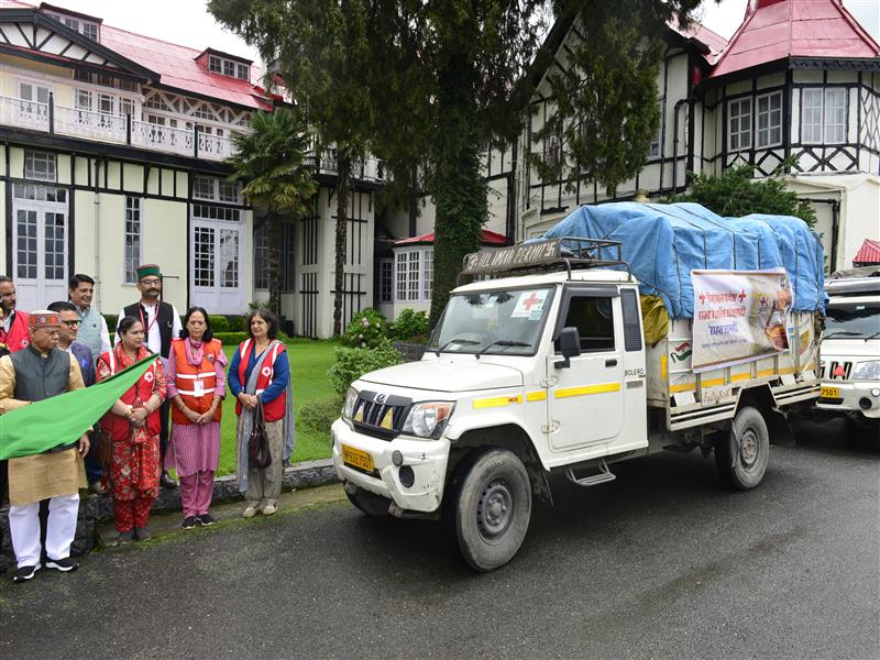 Governor flags off vehicles with relief material